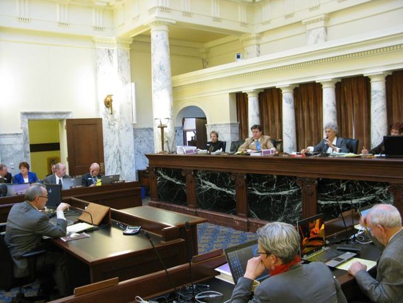 Members of the Joint Finance-Appropriations Committee on Friday discuss the upcoming big debate and vote on the public school budget, which is set for Monday. (Betsy Russell)