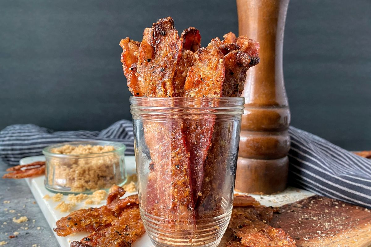 This candied bacon recipe requires three ingredients: bacon, black pepper and brown sugar.  (Audrey Alfaro/For The Spokesman-Review)