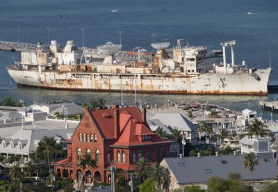 The retired U.S. missile tracking ship Gen. Hoyt S. Vandenberg arrives in Key West, Fla., on April 22. The ship is scheduled to be intentionally sunk Wednesday in the Florida Keys National Marine Sanctuary.  (Associated Press / The Spokesman-Review)