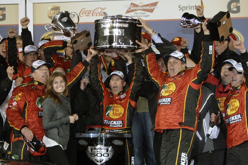 Jamie McMurray, center, celebrates in Victory Lane with his crew after winning the Daytona 500 by .119 seconds.Associated press (Associated press)