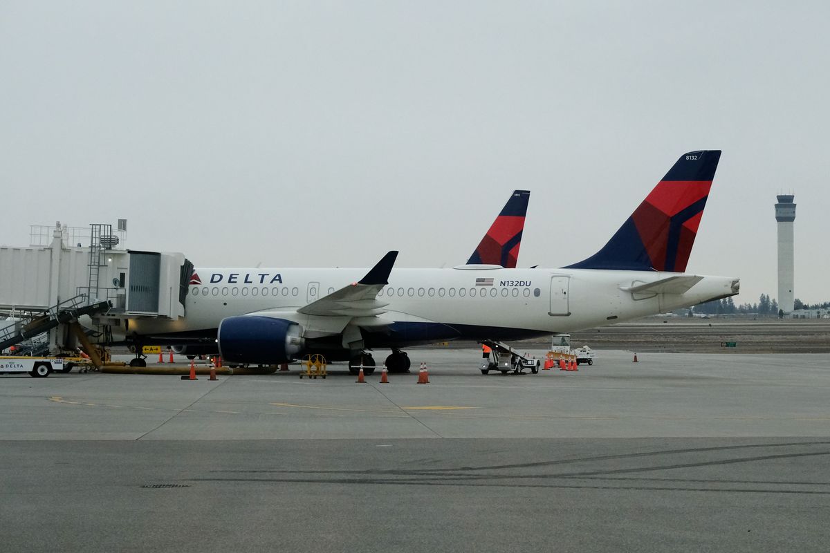 Planes await passengers on the tarmac Nov 18, 2021, at the Spokane International Airport. Spokane County could change its zoning code to prohibit new residential development at the ends of airport runways.   (Tyler Tjomsland/The Spokesman-Review)