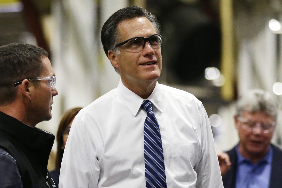 Republican presidential candidate and former Massachusetts Gov. Mitt Romney wears protective glasses as he tours Worthington Industries, a metal processing company, in Worthington, Ohio, Thursday, Oct. 25, 2012. (Charles Dharapak / Associated Press)