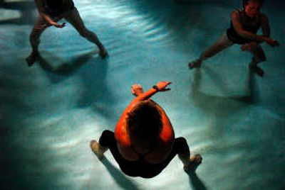 
Patty Murphy, lower center,  teaches a class the art of water ai chi in the pool at North Spokane Physical and Sports Therapy Clinic. 
 (Jed Conklin / The Spokesman-Review)