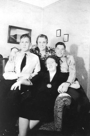 Fred Carter, right, poses with his hosts, Ada Schaefer (seated) and Eva Hardin, along with fellow airman Charlie Abbott. The two Royal Air Force servicemen spent their leave at the women’s home in Spokane in October 1944.