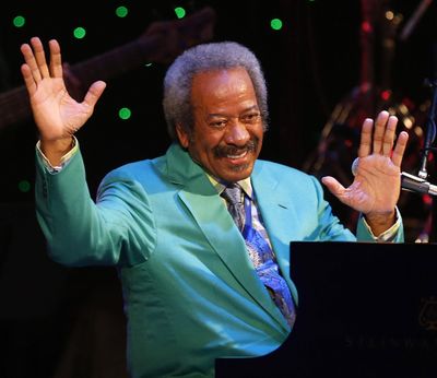 Allen Toussaint thanks the audience after a benefit concert/tribute in his honor at Harrah’s New Orleans Theatre on April 30, 2013. Legendary New Orleans musician and composer Toussaint died Monday.