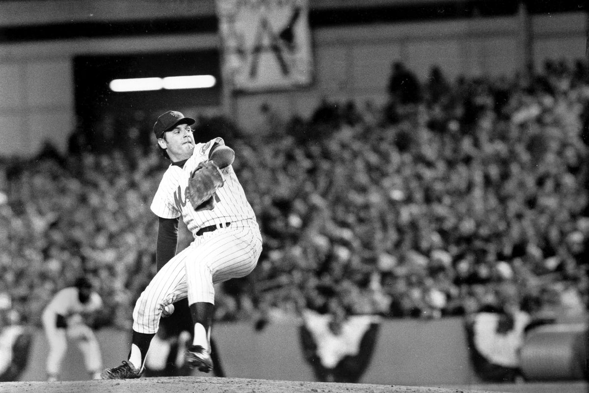 In this Oct. 16, 1973, file photo, New York Mets pitcher Tom Seaver winds up during first inning of Game 3 of the World Series against the Oakland Athletics at Shea Stadium in New York. Seaver, the galvanizing leader of the Miracle Mets 1969 championship team and a pitcher who personified the rise of expansion teams during an era of radical change for baseball, has died. He was 75. The Hall of Fame said Wednesday night, Sept. 2, 2020, that Seaver died Aug. 31 from complications of Lewy body dementia and COVID-19.  (Associated Press)