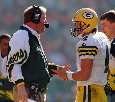 Mike Holmgren, left, and Brett Favre developed a close relationship as coach and player in Green Bay.  (File Associated Press / The Spokesman-Review)