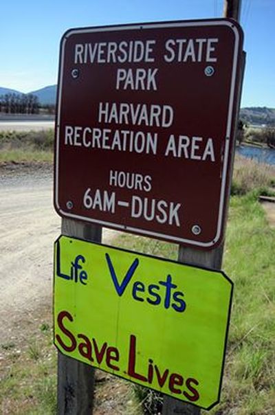 Wise words posted at the Harvard Road boat access area on the Spokane River. (Bart Rayniak)