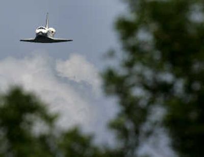 
The space shuttle Endeavour glides to a landing Tuesday afternoon in Cape Canaveral, Fla., ending a nearly two-week 5.3-million-mile journey to the International Space Station.
 (AP / The Spokesman-Review)
