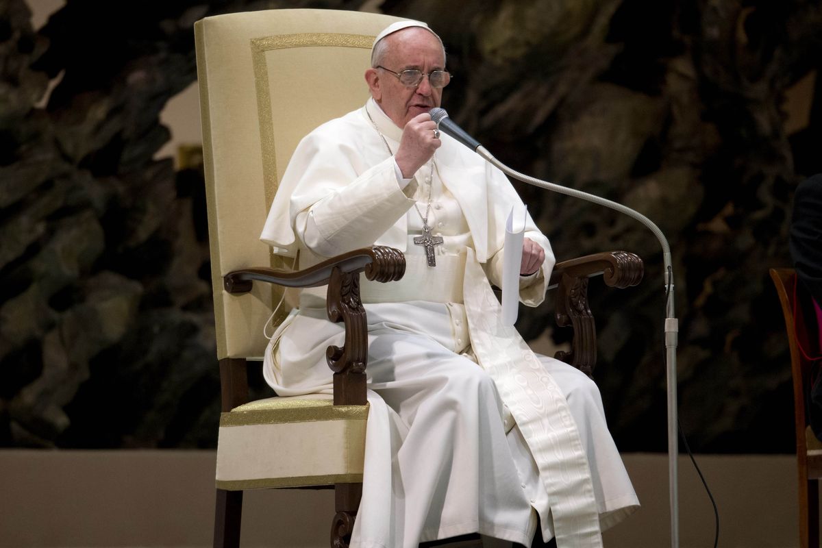 Pope Francis gestures during a meeting with the media at the Pope VI hall, at the Vatican, Saturday, March 16, 2013. (Michael Sohn / Associated Press)