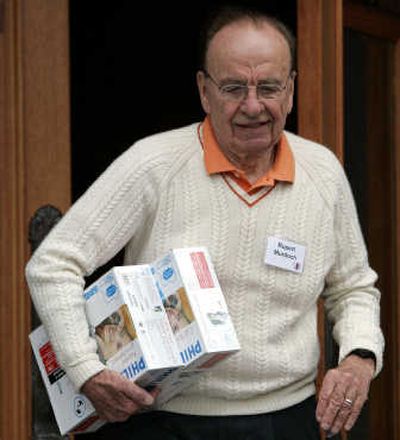 
Rupert Murdoch, chairman and CEO of News Corp., leaves for a break during last year's annual Allen & Co. media conference in Sun Valley. He's back this year for more talk about the future of media. 
 (File Associated Press / The Spokesman-Review)