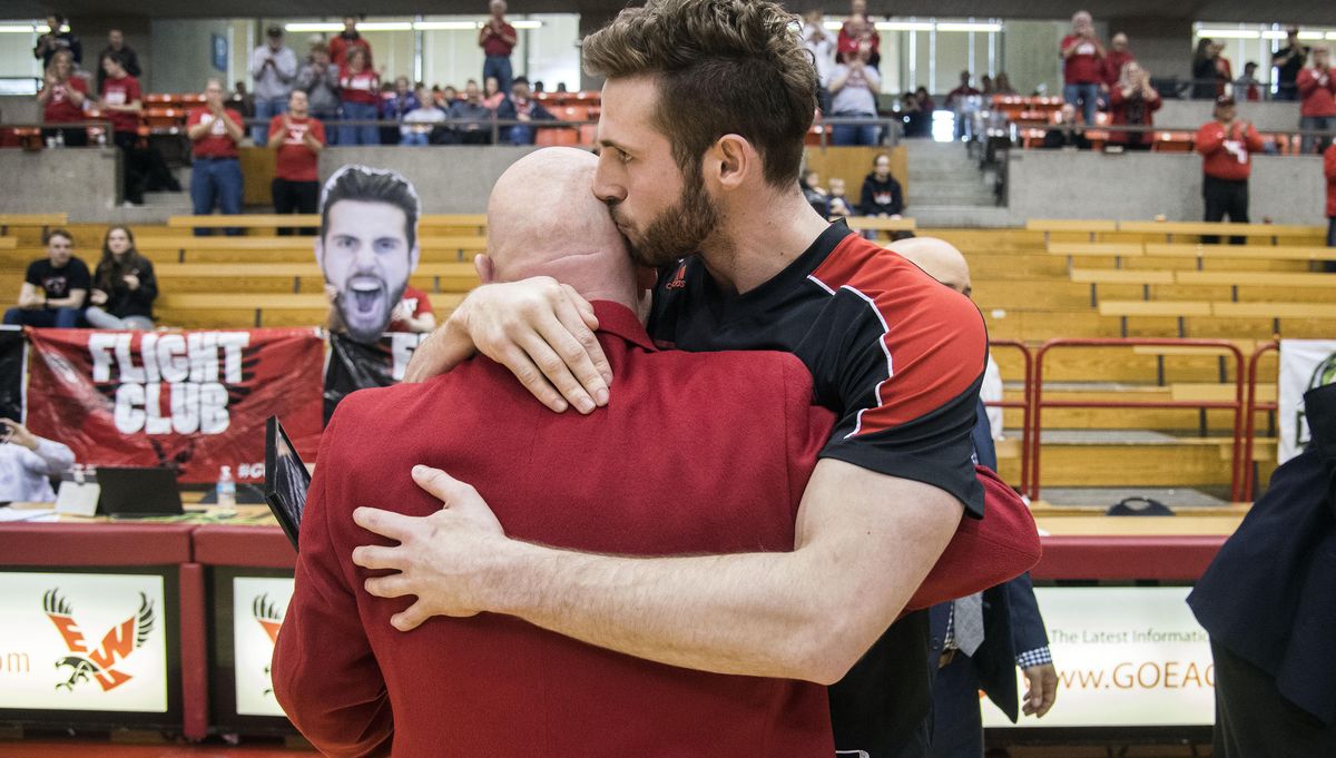 Eastern Washington University senior forward Felix Von Hofe embraces head coach Jim Hayford during Senior Day ceremonies before playing Idaho State, Feb. 25, 2017, in Cheney, Wash. (Dan Pelle / The Spokesman-Review)