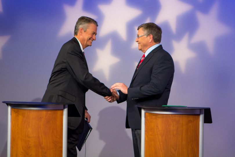 Idaho Lt. Gov. Brad Little, left, and Democratic challenger Bert Marley, right, shake hands at their televised debate on Thursday (Idaho Public Television / Kevin Rank)