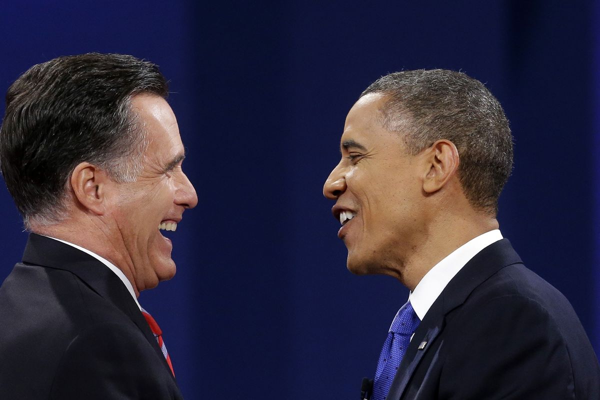 Republican president candidate former Massachusetts Gov. Mitt Romney and President Barack Obama meet at the end of the last debate at Lynn University, Monday, Oct. 22, 2012, in Boca Raton, Fla. (Pablo Monsivais / Associated Press)