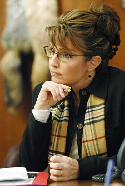 
Alaska Gov. Sarah Palin, a Sandpoint, Idaho, native, listens to questions during an interview in her office earlier this month  in Juneau. Associated Press
 (Associated Press / The Spokesman-Review)