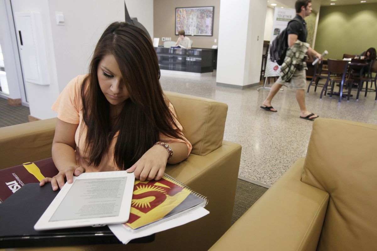 Claire Becerra, a political science major at Arizona State University, uses her Kindle DX in Tempe, Ariz.Associated Press photos (Associated Press photos / The Spokesman-Review)