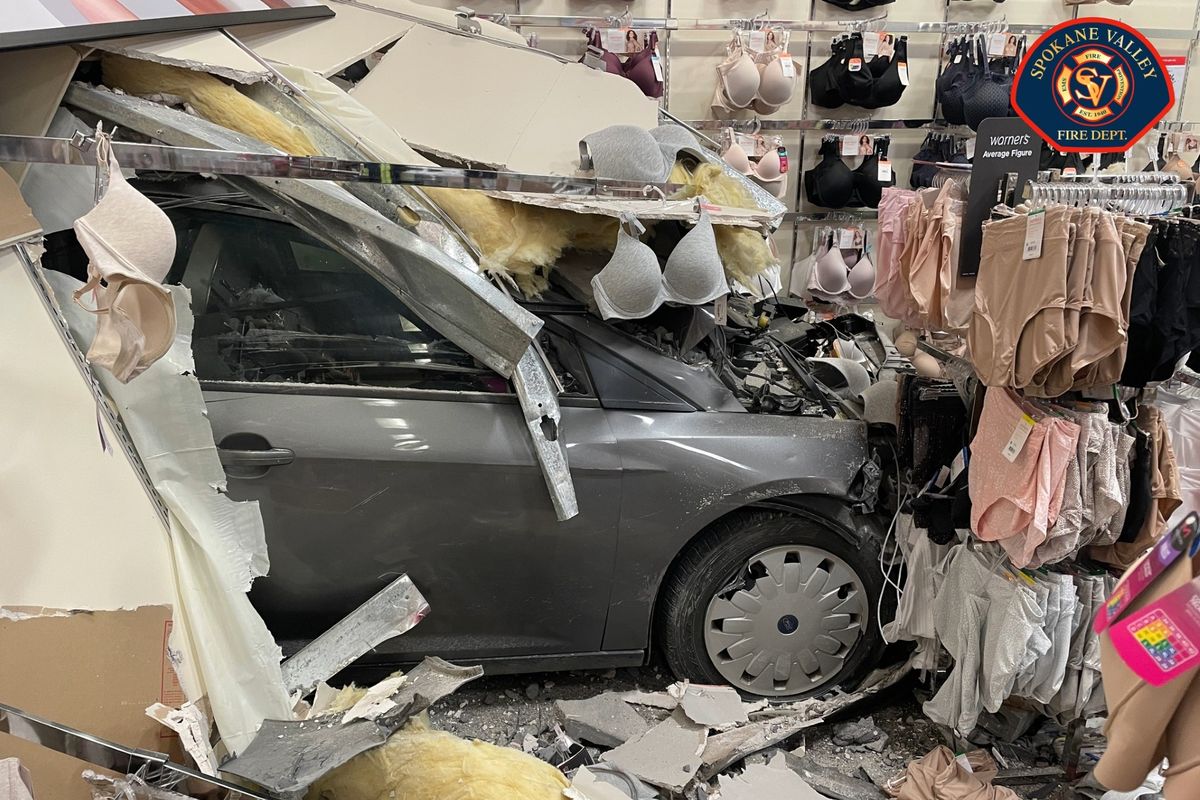 A car crashed into the JCPenney at the Spokane Valley Mall on Wednesday. The driver was reportedly in a mental health crisis.  (Courtesy of Spokane Valley Fire Department)