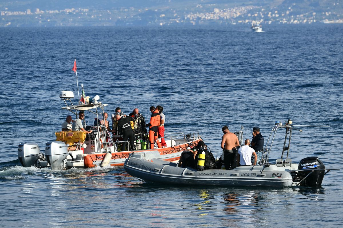 Rescue teams operate off Porticello harbor near Palermo, searching for a last missing person on Aug. 22 three days after the British-flagged luxury yacht Bayesian sank.  (Getty Images)