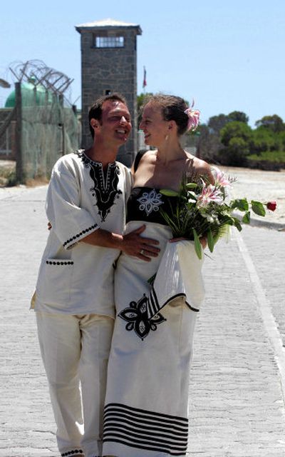 Mario Pare, of Quebec, Canada,  stands with his new wife, Jacqui Middlewick, of South Africa,  after a Valentine's Day wedding ceremony on Robben Island, South Africa, on Tuesday.
 (Associated Press / The Spokesman-Review)