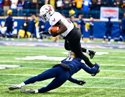 Eastern Washington running back Tuna Altahir tries to break free of a tackle by Montana State safety Blake Stillwell during a Big Sky Conference game Saturday in Bozeman.  (Courtesy of EWU Athletics)