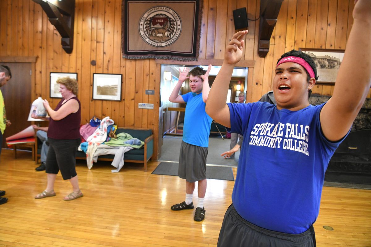 Cullen, 25, far right, practices his singing, Tuesday, June 5, 2018, during rehearsal for a talent show by members of the PACE program where adults with disabilities are introduced to the arts to gain confidence and compassion. The group will put on a talent show Friday, June 8, 2018 at Life Center Church. (Jesse Tinsley / The Spokesman-Review)