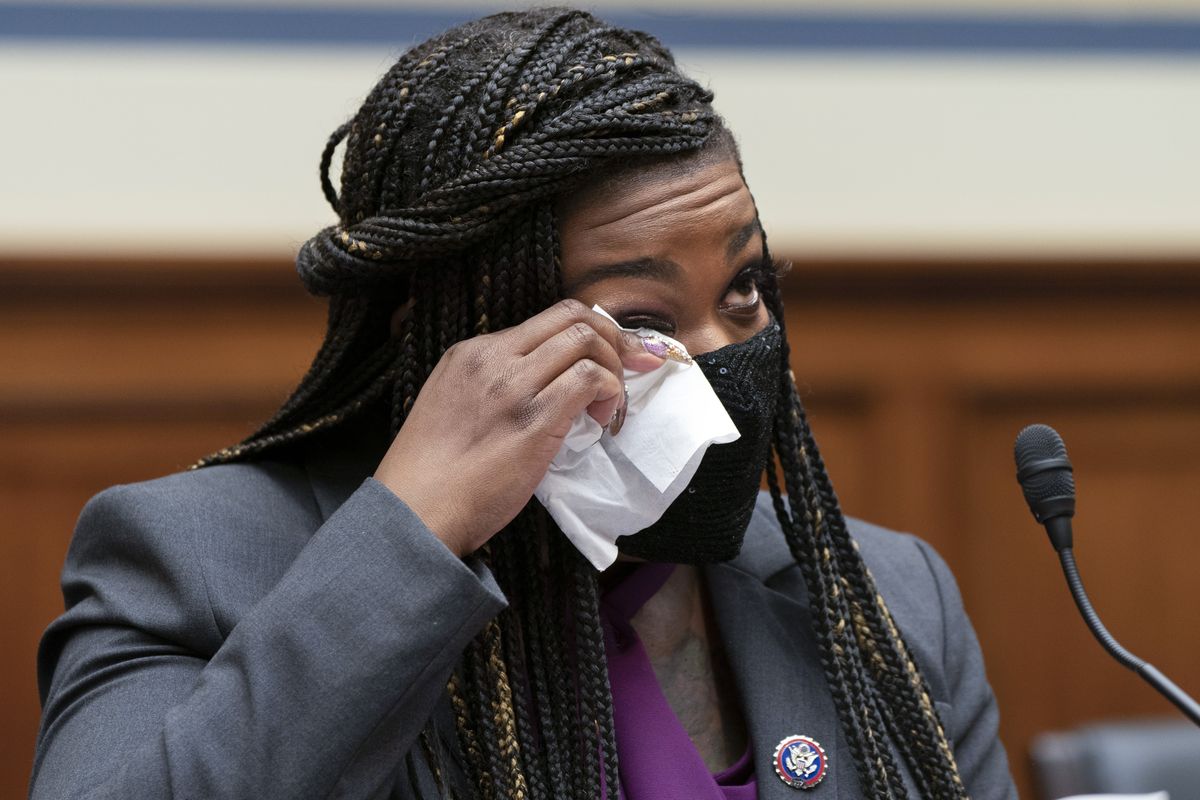 Rep. Cori Bush, D-Mo., wipes away a tear as she prepares to testify about her experience being raped and a subsequent abortion Thursday during a House Committee on Oversight and Reform hearing on Capitol Hill in Washington, D.C.  (Associated Press)