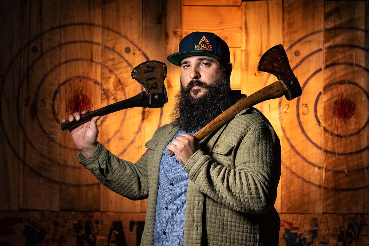 Miguel Tamburini, owner of Jumping Jackalope Axe Throwing, has been the No. 1-rated ax thrower in the world twice. His new shop has reopened at 226 W. Riverside Ave., and he’s bringing an ax-throwing competition to Spokane next weekend.  (Colin Mulvany/The Spokesman-Review)
