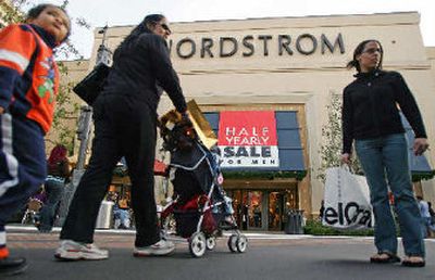
Retailers cash in as consumers flock to the malls during the holiday shopping season.
 (The Spokesman-Review)