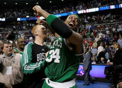 
Forward Paul Pierce (34) leads the Celtics' celebration after Boston's 89-81 Game 6 win over the Detroit Pistons on Friday night. Associated Press
 (Associated Press / The Spokesman-Review)
