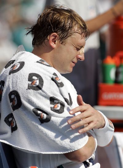 Shoulder injury likely to sideline Dolphins’ QB Chad Pennington. (Associated Press / The Spokesman-Review)