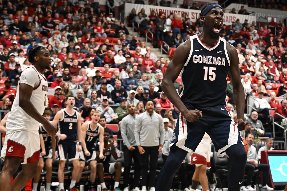 Gonzaga Bulldogs forward Graham Ike (15) celebrates after scoring in the paint against WSU as Cougars forward Emmanuel Ugbo (0) reacts during the second half of a college basketball game on Thursday, Jan 15, 2026, at Beasley Coliseum in Pullman, Wash. Gonzaga won the game 86-65.  (Tyler Tjomsland/The Spokesman-Review)