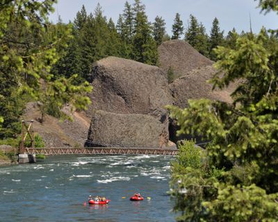 A group of rafters floats the Spokane River through the Bowl and Pitcher area of Riverside State Park. (Rich Landers)