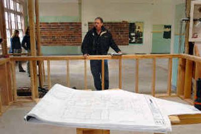 
Brian McMenamin looks over the construction progress at the St. Francis of Assisi School in Bend, Ore. It is being converted into a pub, theater, and hotel complex.
 (Associated Press / The Spokesman-Review)