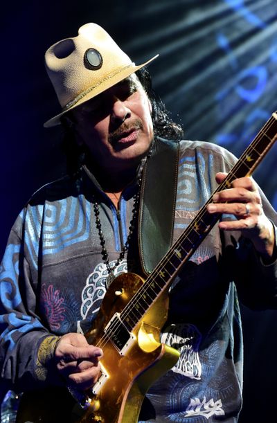 Santana will brings its “Divination” tour to the Spokane Arena on Sunday. (Maryanne Bilham)