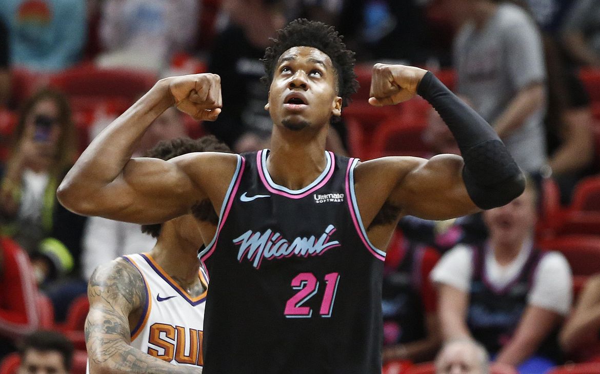 AP source Hassan Whiteside opts in for 27 million with Heat The