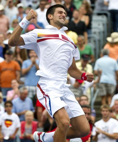 Novak Djokovic celebrates his match point against Mardy Fish to win the men's final at the Rogers Cup tennis tournament. (Associated Press)