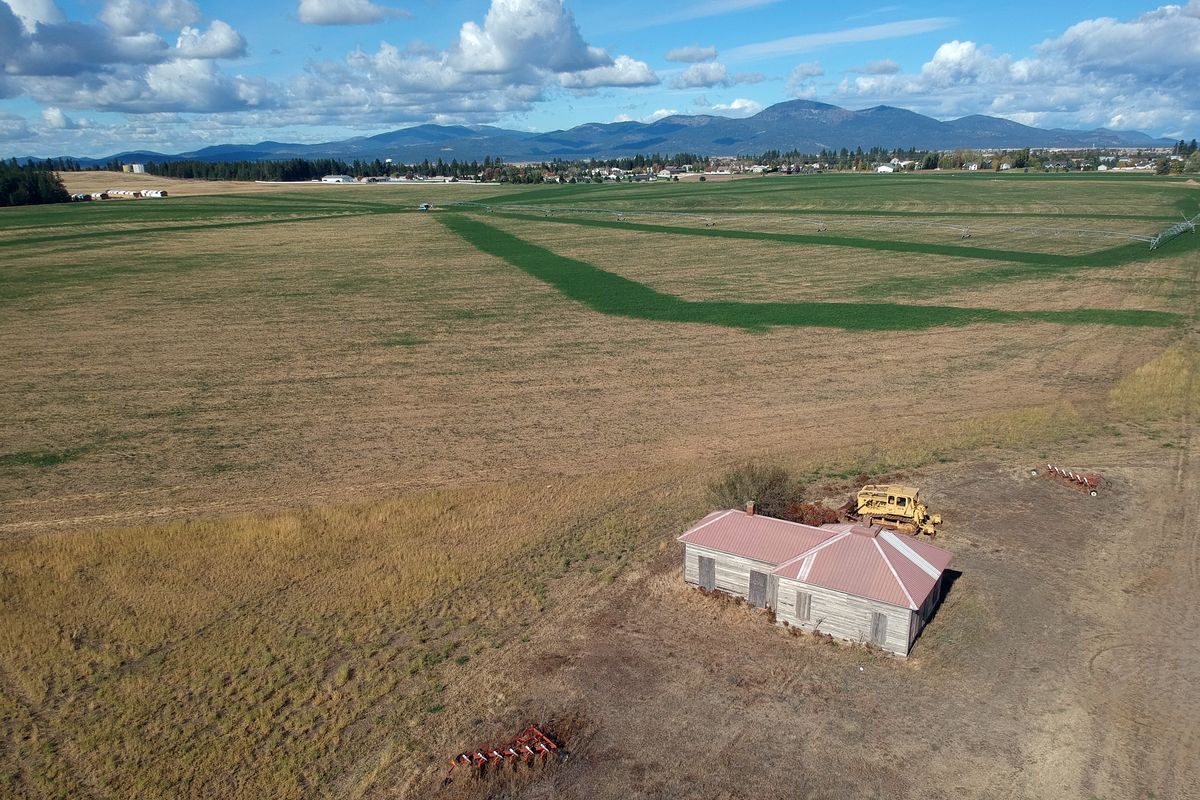A thousand acres of farm land, much of which is seen in this photo looking northwest near Huetter Road and Mullan Road, between Coeur d’Alene and Post Falls, may soon to be developed in Kootenai County.  (Jesse Tinsley/The Spokesman-Review)