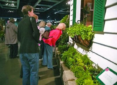 
Northwest Flower and Garden Show in Seattle offered new Green Garage display. Page 10 
 (The Spokesman-Review)
