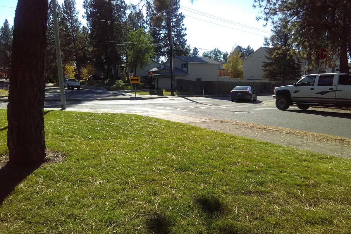 A traffic calming island divider is seen at the intersection of Colton Street and Magnesium Road in the Shiloh Hills Neighborhood in north Spokane. The island has largely been ineffective, and residents voted at a neighborhood council meeting in August 2018 to have it removed. (Terence Vent / The Spokesman-Review)