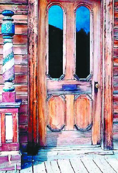 
One of the rustic, beautiful doors that opens up to the town and buildings. 
 (The Spokesman-Review)