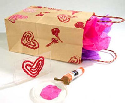  Grab a discarded plastic audiocassette case, an old key and a piece of string. You're going to turn these junk-drawer treasures into stamps for printing cool Valentine's Day greetings by the dozen.
 (King Features Syndicate / The Spokesman-Review)