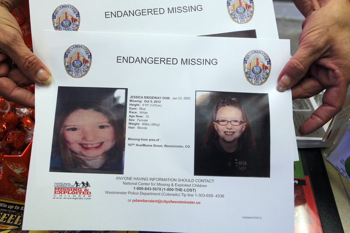 A missing poster for ten-year-old Jessica Ridgeway is seen in Broomfield, Colo., on Monday, Oct. 8, 2012. The youngster has been missing since she left her home Friday morning on her way to school. (Ed Andrieski / Associated Press)