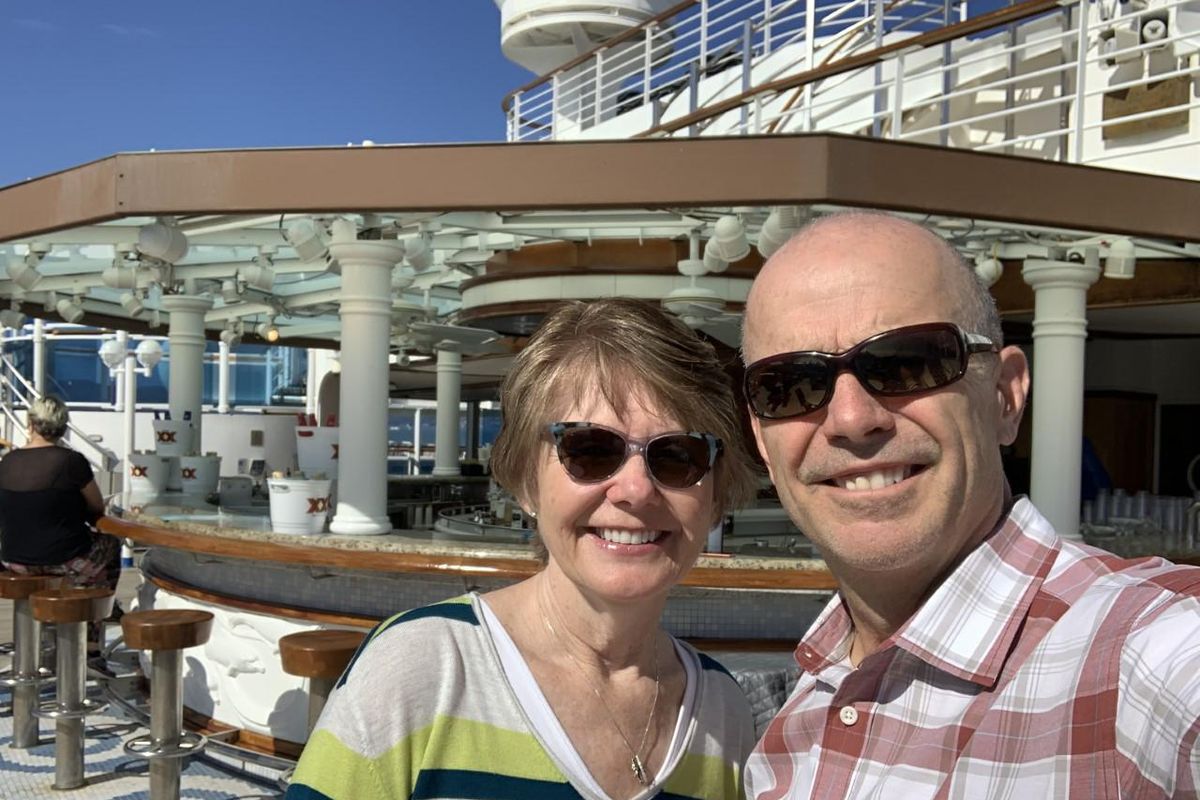 Nancy and David Holmes pose for a selfie when the Grand Princess was docked in Kauai. Their Hawaiian cruise was fun, the couple said, and it was on their way back to California that they got the news of a passenger on the previous voyage testing positive for COVID-19. (Courtesy of Nancy and David Holm)