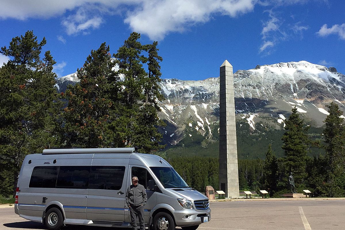 Doris and Rod Butler of Liberty Lake enjoy traveling in their Class B Sprinter van. In this shot, Rod stands by the vehicle at Marias Pass, Mont.