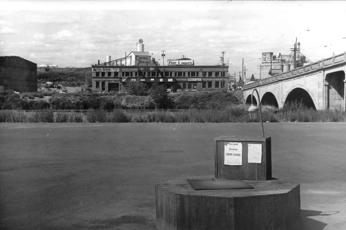 One public notice on former railroad property on the south side of the Spokane River near the Division Street Bridge is an application for a liquor license for a new restaurant, seen here in a 1977 photo. Another is for a shoreline permit for a 70-unit condominium development east of Division, though it wouldn’t be built for another 15 years. The restaurant, C.I. Shenanigans, opened in 1980, but was torn down in 2013 to make way for an expansion of the Spokane Convention Center. (THE SPOKESMAN-REVIEW PHOTO ARCHIVE / SR)