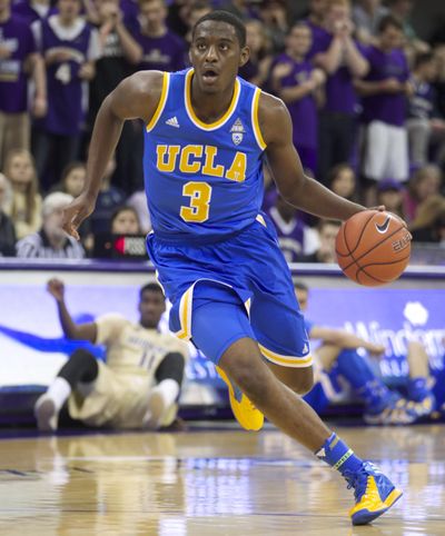 Despite leg cramps, Jordan Adams scored a career-high 31 points to lead UCLA past Washington. (Associated Press)