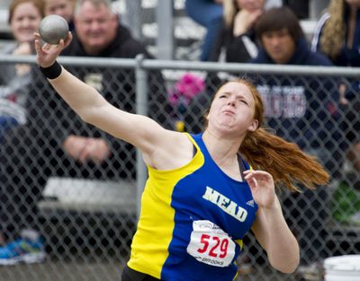 Mead’s Courtney Hutchinson unleashes a toss in the 4A shot put finals. She won at 46 feet, 8¼ inches. (Patrick Hagerty)