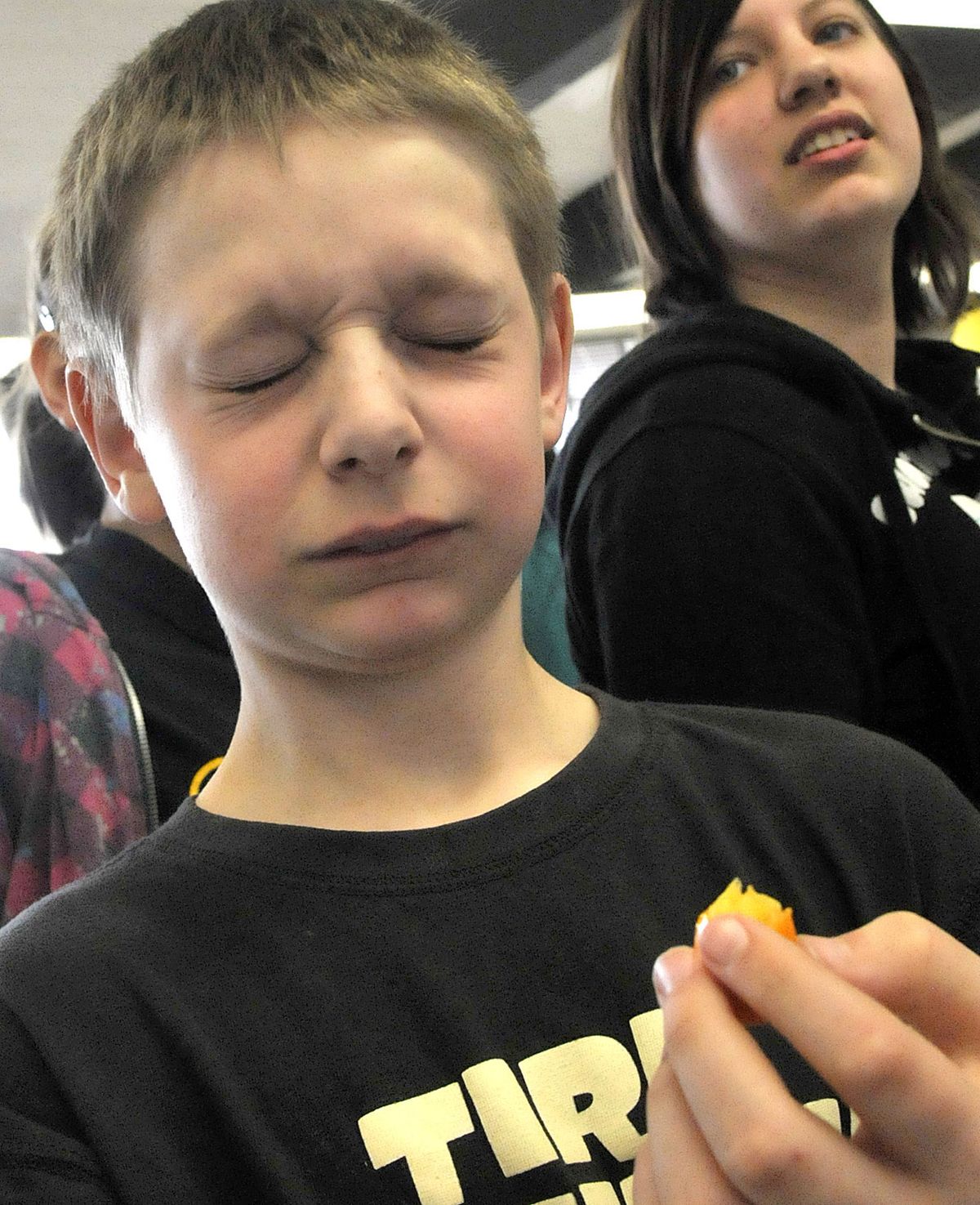 Tyler Colweal reacts to the taste of a Kumquat as Shaw Middle School students in Spokane, Wash., participate in a lunch Food Fear Factor on Friday, April 9, 2010. (Christopher Anderson / The Spokesman-Review)