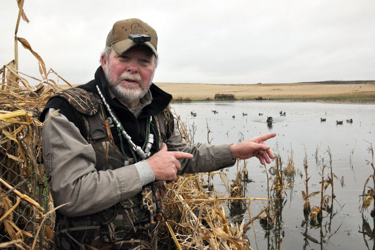 Waterfowl hunting outfitter Paul Sullivan, talking over his strategy at Paul