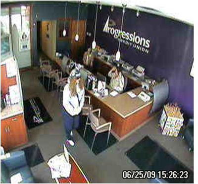 Spokane Valley police say this woman stole money from the Progressions Credit Union, 1507 N. Pines Road, about 3:30 p.m. June 25 after displaying a black pistol. (Courtesy of Spokane Valley Police Department)